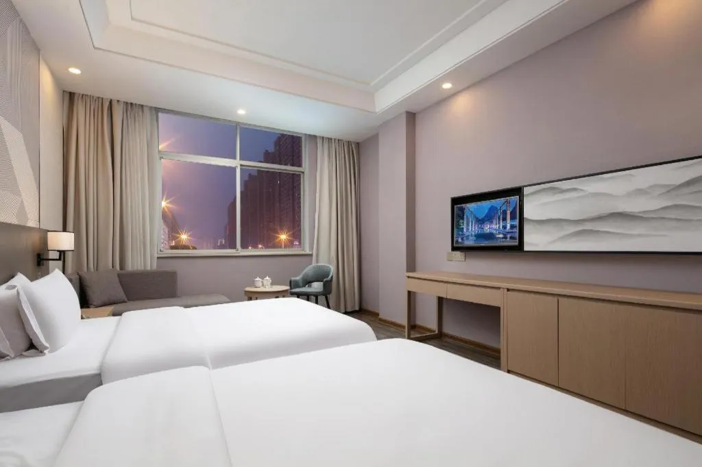 Bed in Borrman Hotel Changsha Yueliang Dao Guanziling Metro Station