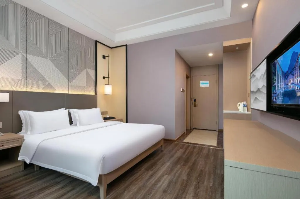 Bed in Borrman Hotel Changsha Yueliang Dao Guanziling Metro Station