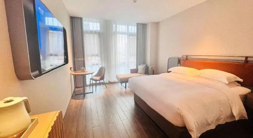 Bed in Echarm Hotel Changsha Huanghua Airport