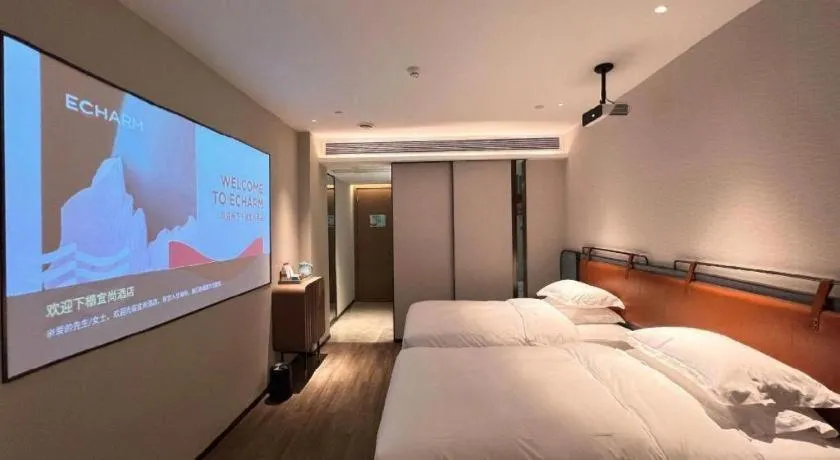 Bed in Echarm Hotel Changsha Huanghua Airport