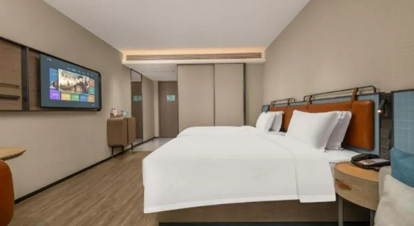 Bed in Echarm Hotel Changsha Huanghua Airport