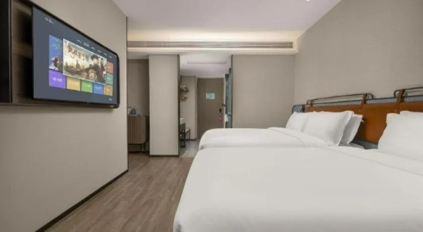 Bed in Echarm Hotel Changsha Huanghua Airport