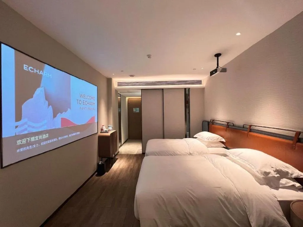 Bed in Echarm Hotel Changsha Huanghua Airport