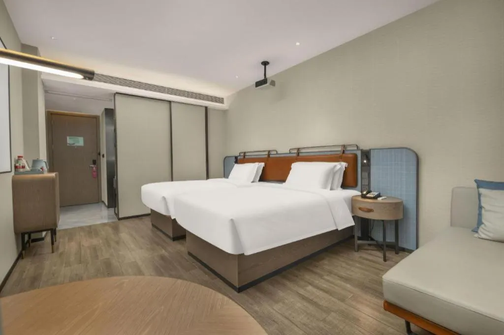 Bed in Echarm Hotel Changsha Huanghua Airport