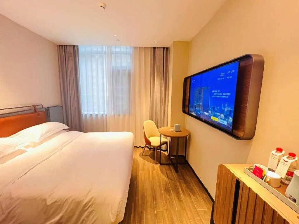 Bed in Echarm Hotel Changsha Huanghua Airport