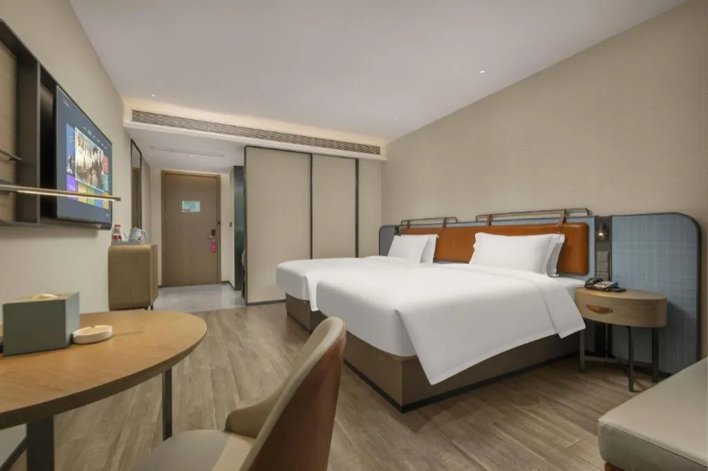Bed in Echarm Hotel Changsha Huanghua Airport