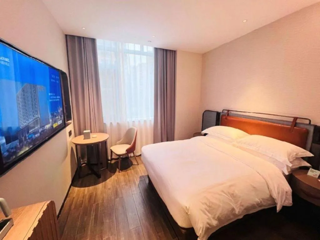 Bed in Echarm Hotel Changsha Huanghua Airport