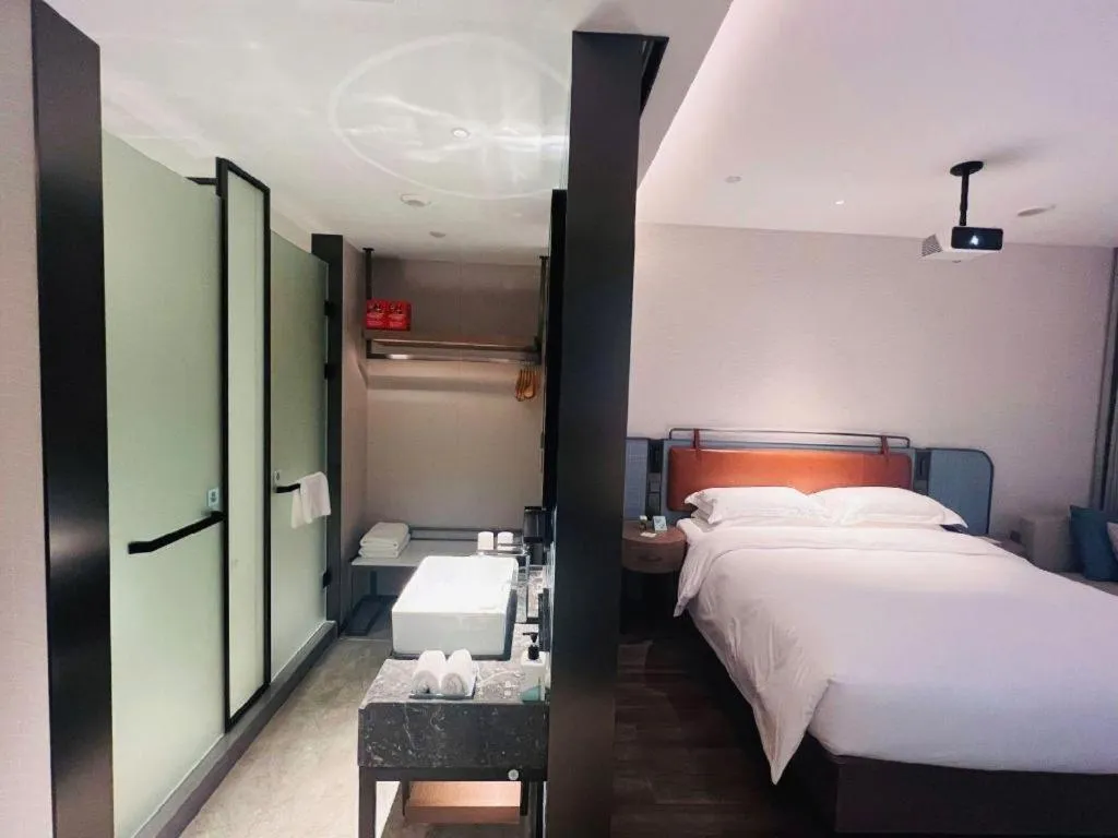 Bed in Echarm Hotel Changsha Huanghua Airport