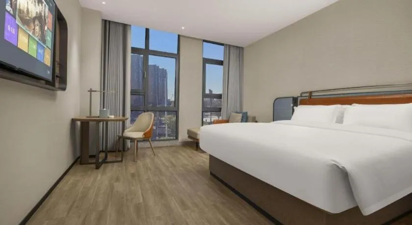 Bed in Echarm Hotel Changsha Huanghua Airport