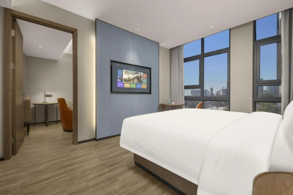 Bed in Echarm Hotel Changsha Huanghua Airport