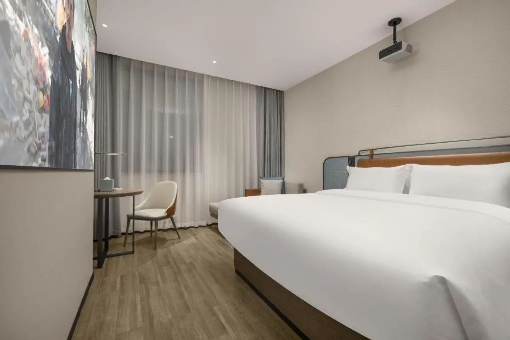 Bed in Echarm Hotel Changsha Huanghua Airport