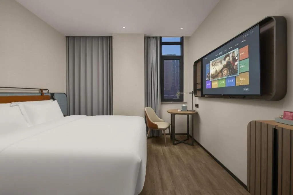 Bed in Echarm Hotel Changsha Huanghua Airport