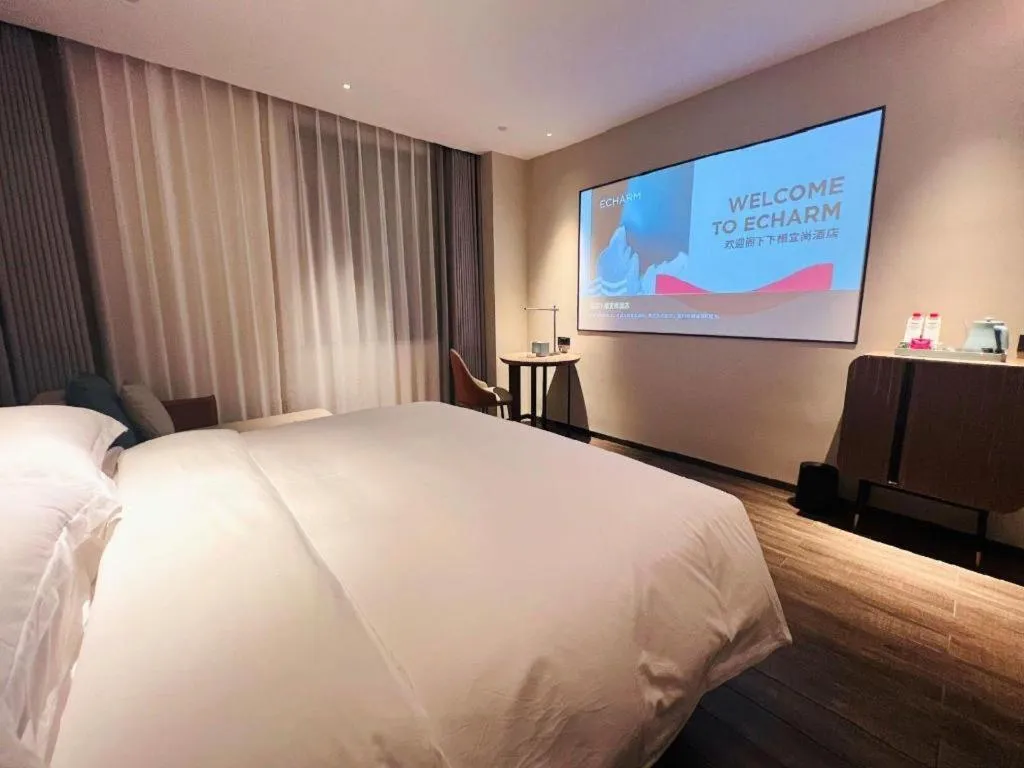Bed in Echarm Hotel Changsha Huanghua Airport