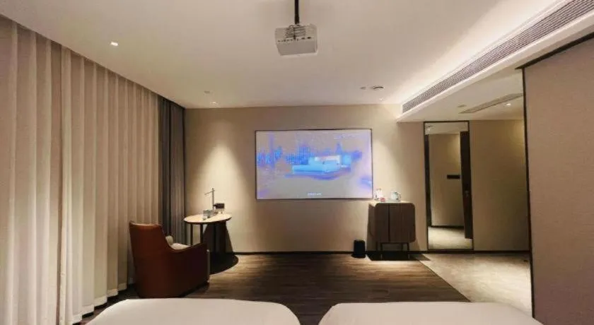 Bed in Echarm Hotel Changsha Huanghua Airport