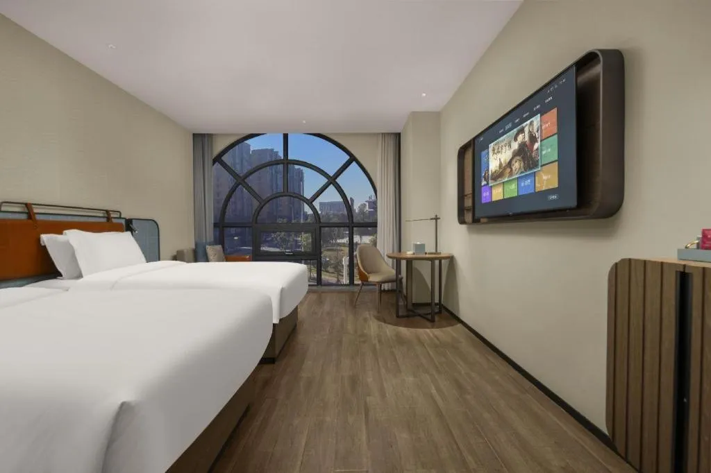 Bed in Echarm Hotel Changsha Huanghua Airport