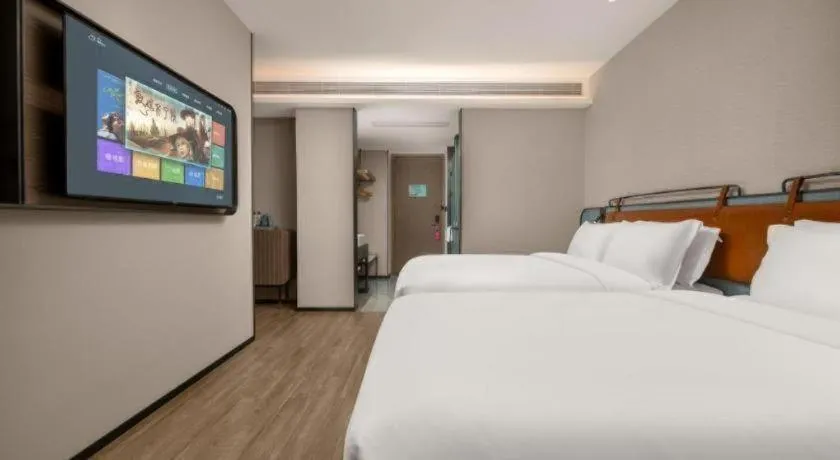 Bed in Echarm Hotel Changsha Huanghua Airport