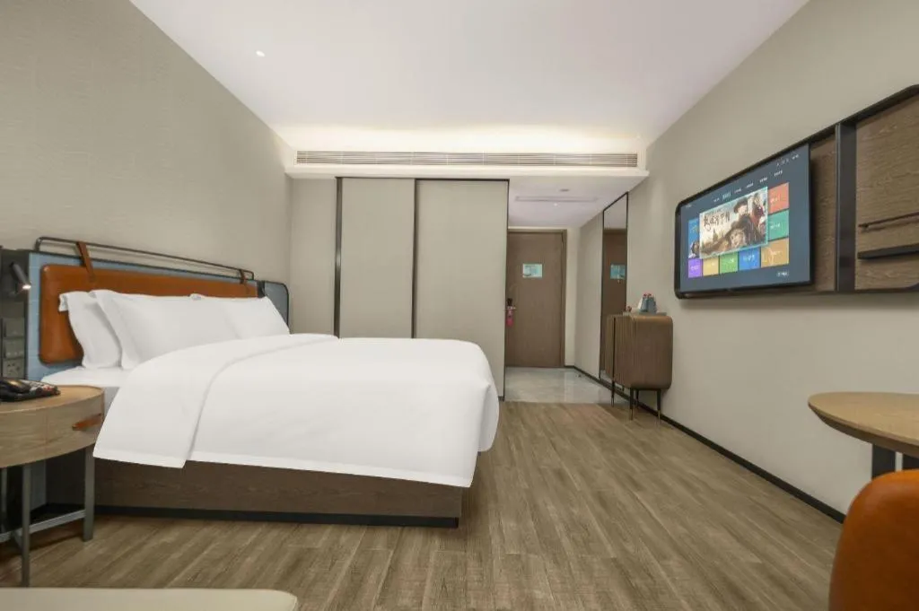 Bed in Echarm Hotel Changsha Huanghua Airport