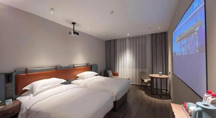 Bed in Echarm Hotel Changsha Huanghua Airport