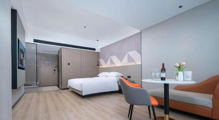 Bed in Borrman Hotel Yongzhou Lingling Ancient Town Government