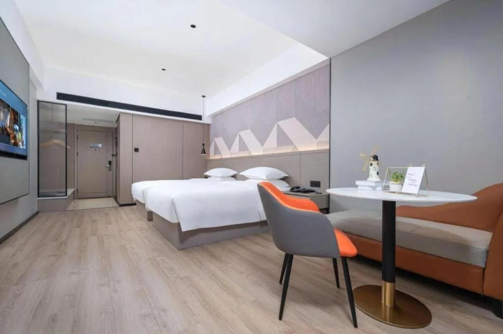 Bed in Borrman Hotel Yongzhou Lingling Ancient Town Government