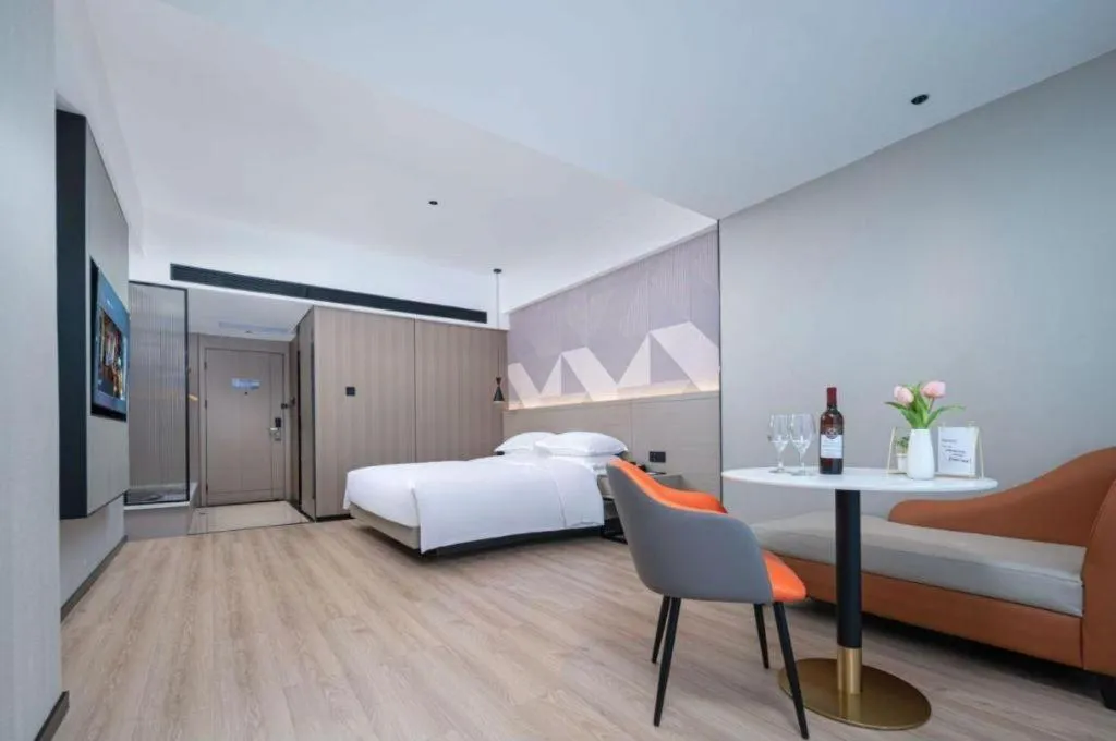 Bed in Borrman Hotel Yongzhou Lingling Ancient Town Government