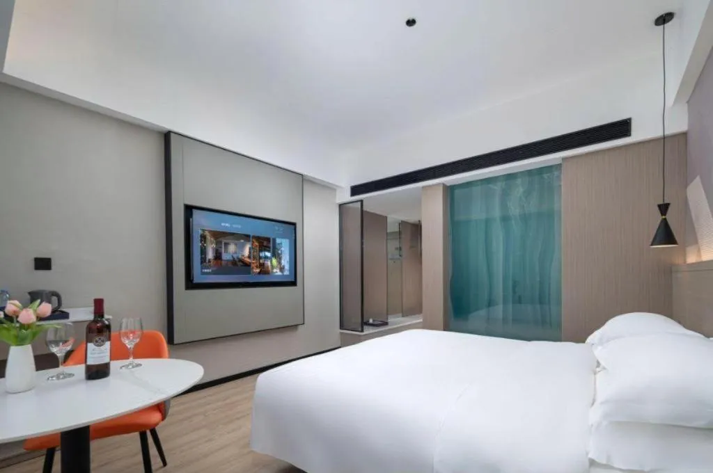 Bed in Borrman Hotel Yongzhou Lingling Ancient Town Government