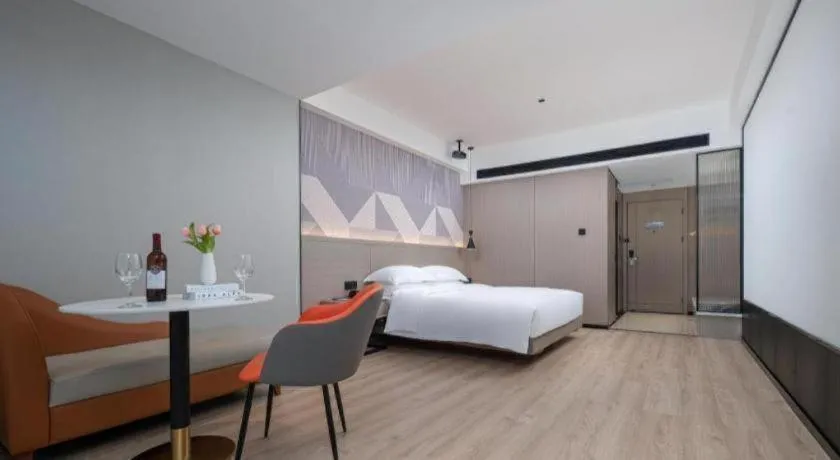 Bed in Borrman Hotel Yongzhou Lingling Ancient Town Government