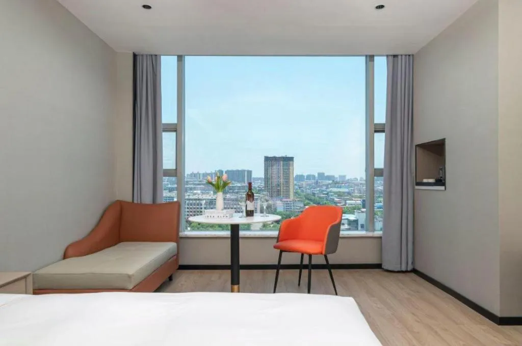 Bed in Borrman Hotel Yongzhou Lingling Ancient Town Government