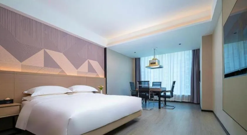 Bed in Borrman Hotel Yongzhou Lingling Ancient Town Government