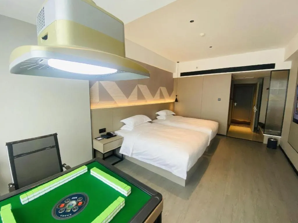 Bed in Borrman Hotel Yongzhou Lingling Ancient Town Government