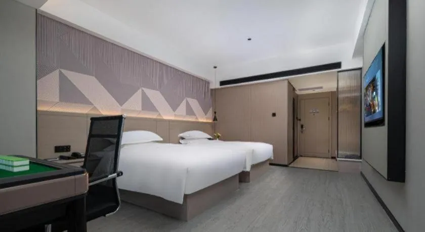 Bed in Borrman Hotel Yongzhou Lingling Ancient Town Government