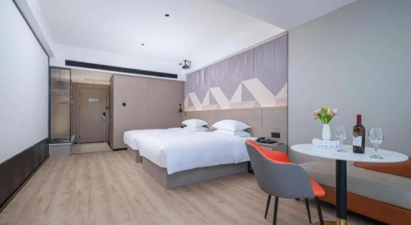 Bed in Borrman Hotel Yongzhou Lingling Ancient Town Government