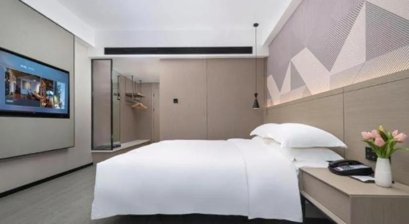 Bed in Borrman Hotel Yongzhou Lingling Ancient Town Government