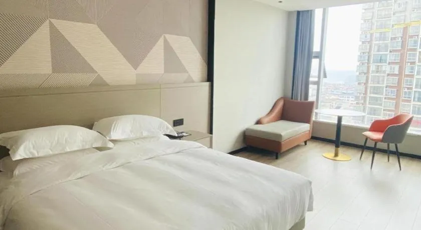 Bed in Borrman Hotel Yongzhou Lingling Ancient Town Government