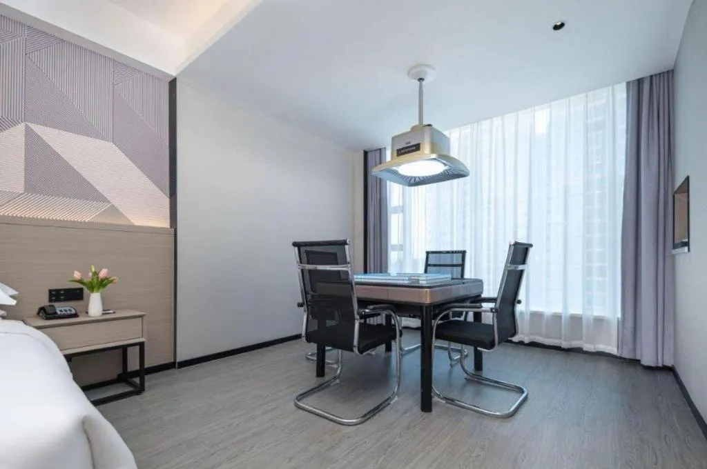 Bed in Borrman Hotel Yongzhou Lingling Ancient Town Government