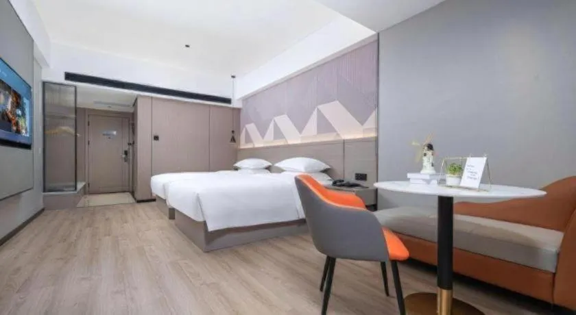 Bed in Borrman Hotel Yongzhou Lingling Ancient Town Government