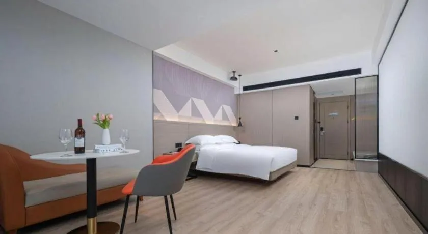 Bed in Borrman Hotel Yongzhou Lingling Ancient Town Government