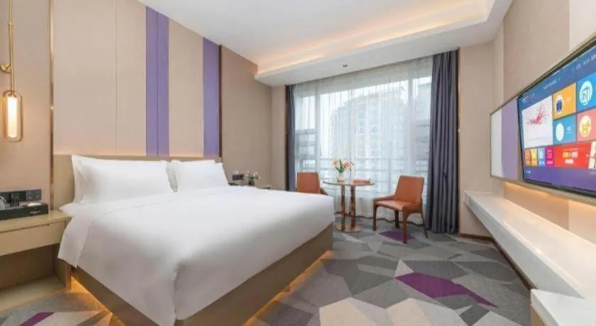 Bed in Borrman Hotel Yongzhou Lingling Ancient Town Government