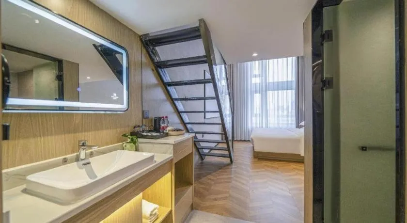 Bed in Borrman Hotel Zhangzhou Baolong Plaza