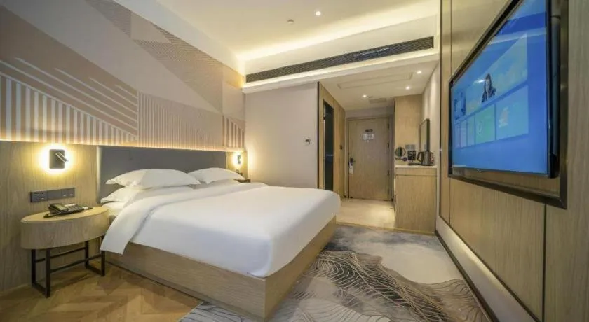 Bed in Borrman Hotel Zhangzhou Baolong Plaza