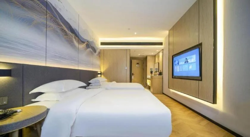 Bed in Borrman Hotel Zhangzhou Baolong Plaza