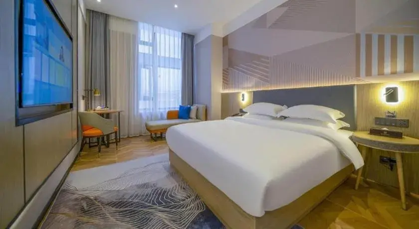 Bed in Borrman Hotel Zhangzhou Baolong Plaza Bed in Borrman Hotel Zhangzhou Baolong Plaza