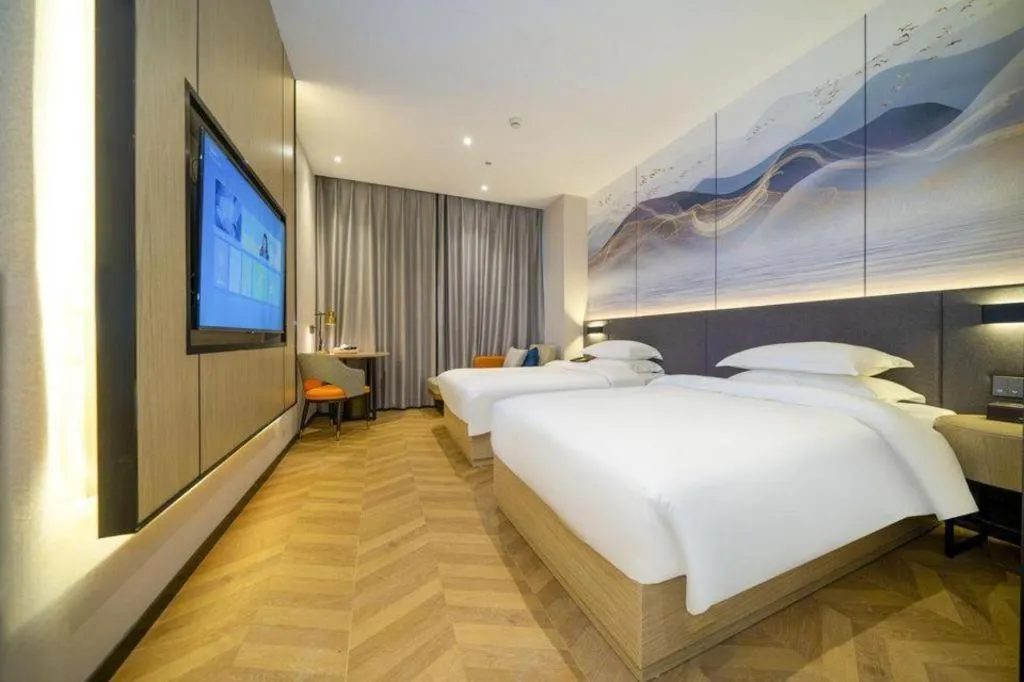 Bed in Borrman Hotel Zhangzhou Baolong Plaza