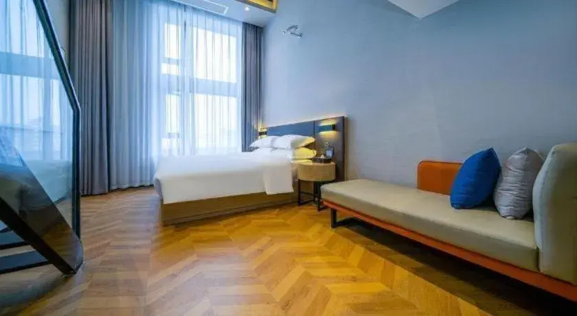 Bed in Borrman Hotel Zhangzhou Baolong Plaza Bed in Borrman Hotel Zhangzhou Baolong Plaza