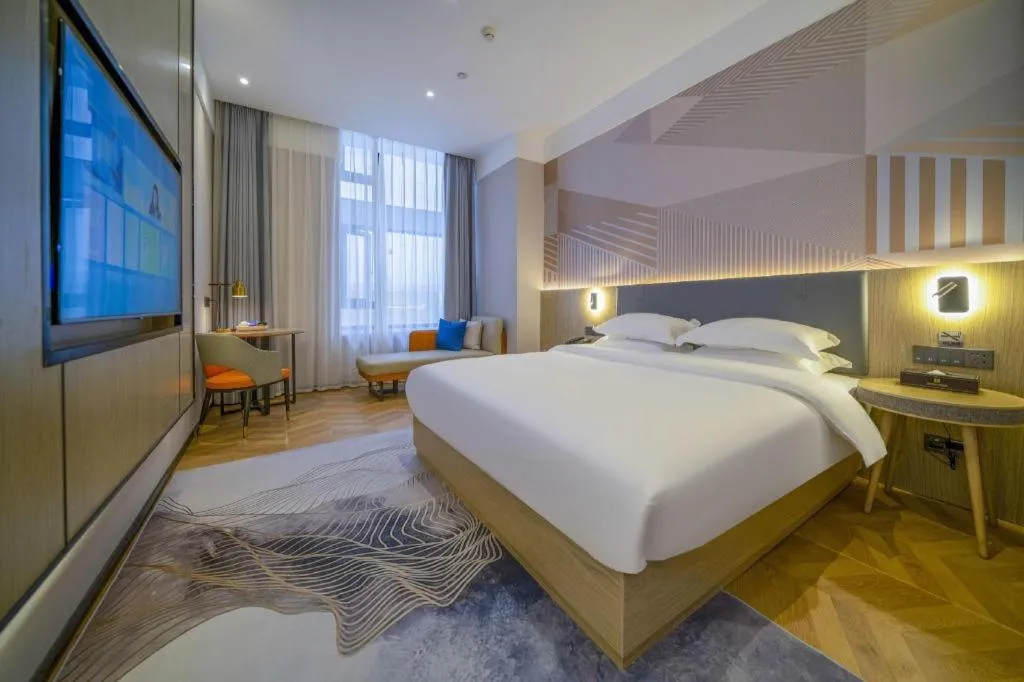 Bed in Borrman Hotel Zhangzhou Baolong Plaza