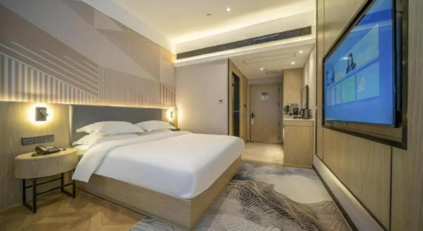 Bed in Borrman Hotel Zhangzhou Baolong Plaza