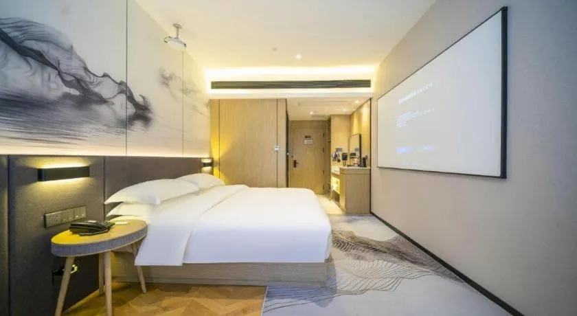 Bed in Borrman Hotel Zhangzhou Baolong Plaza