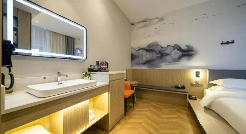 Bed in Borrman Hotel Zhangzhou Baolong Plaza