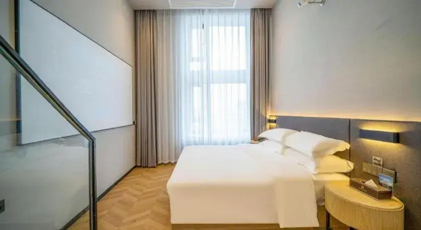 Bed in Borrman Hotel Zhangzhou Baolong Plaza Bed in Borrman Hotel Zhangzhou Baolong Plaza