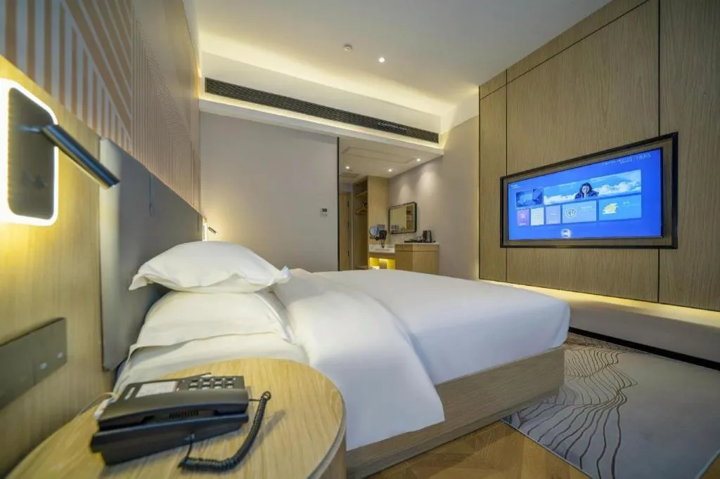 Bed in Borrman Hotel Zhangzhou Baolong Plaza